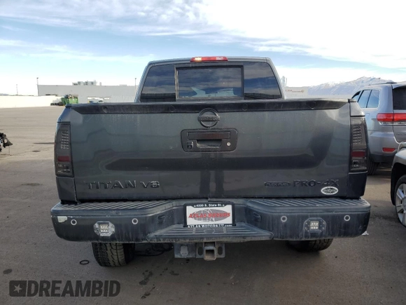 2013 Nissan Titan Pro-4X with VIN 1N6BA0EC2DN305708, listed as a Copart auction lot 45329275 with 68,636 mi miles and Salvage title. Bid and sale history available at DreamBid. Image 6.