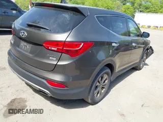 2014 Hyundai Santa Fe with VIN 5XYZTDLB2EG143925, listed as a IAAI auction lot 42243761 with 126,058 mi miles and . Bid and sale history available at DreamBid. Image 4.