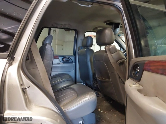 2003 GMC Envoy SLT with VIN 1GKDS13S932299354, listed as a IAAI auction lot 41238557 with 251,535 mi miles. Bid and sale history available at carsss.com. Image 8.