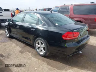 2015 Volkswagen Passat 1.8T Limited Edition with VIN 1VWAT7A31FC111352, listed as a IAAI auction lot 41575307 with 130,080 mi miles. Bid and sale history available at carsss.com. Image 3.