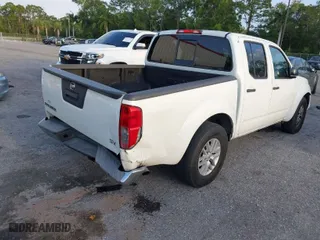 2018 Nissan Frontier SV V6 with VIN 1N6AD0ER1JN717377, listed as a IAAI auction lot 41888219 with 118,963 mi miles. Bid and sale history available at carsss.com. Image 4.