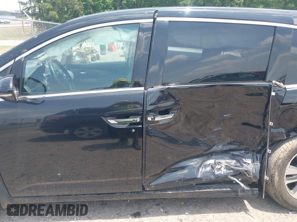 2015 Honda Odyssey Touring Elite with VIN 5FNRL5H90FB003506, listed as a IAAI auction lot 42585049 with 120,543 mi miles and . Bid and sale history available at DreamBid. Image 14.