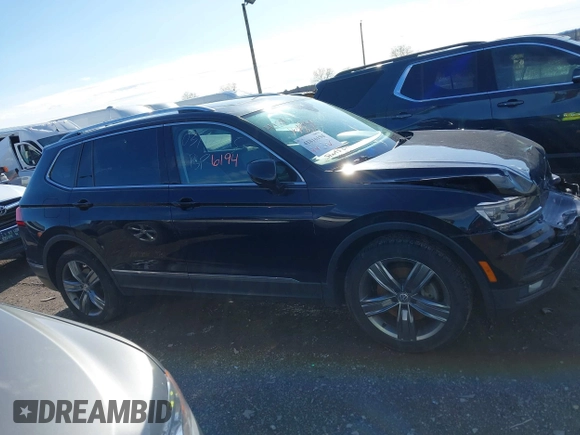 2018 Volkswagen Tiguan SEL Premium with VIN 3VV5B7AX8JM073475, listed as a IAAI auction lot 41816194 with 65,838 mi miles and . Bid and sale history available at DreamBid. Image 13.