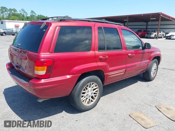 2004 Jeep Grand Cherokee Limited with VIN 1J4GX58N34C401838, listed as a IAAI auction lot 42714681 with 205,477 mi miles and . Bid and sale history available at DreamBid. Image 4.