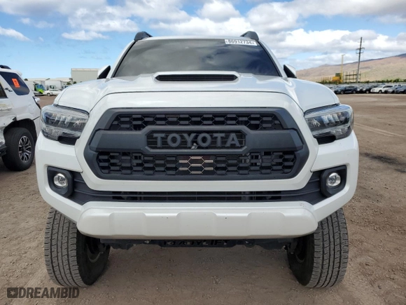 2022 Toyota Tacoma 4WD SR with VIN 3TYCZ5AN7NT101670, listed as a Copart auction lot 86912734 with 21,376 mi miles and Salvage Title. Bid and sale history available at carsss.com. Image 5.