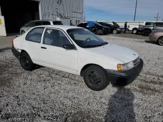 1994 Toyota Tercel with VIN JT2EL46S5R0447670, listed as a Copart auction lot 85165504 with 214,199 mi miles and Salvage Title. Bid and sale history available at carsss.com. Image 4.