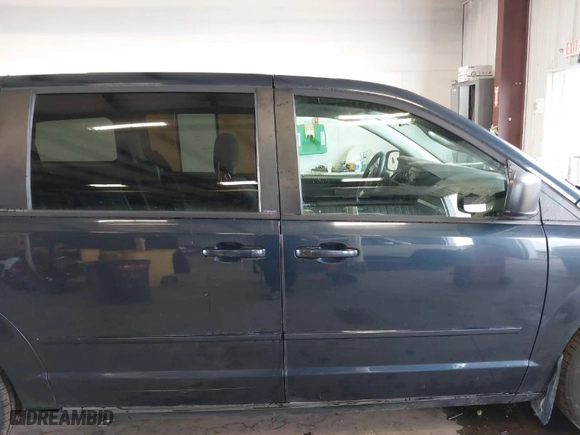 2009 Dodge Grand Caravan SE with VIN 1D8HN44E39B502635, listed as a IAAI auction lot 42003196 with 119,887 mi miles. Bid and sale history available at carsss.com. Image 13.