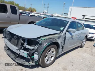 2022 Dodge Charger SXT with VIN 2C3CDXBG7NH204659, listed as a IAAI auction lot 41882695 with 49,773 mi miles and . Bid and sale history available at DreamBid. Image 2.