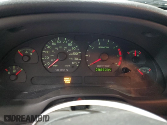 2003 Ford Mustang Deluxe z VIN 1FAFP44433F369534, wystawiony jako Copart lot #76606794 z przebiegiem 88 503 mil mil oraz Szkoda całkowita • Salvage title. Historia ofert i sprzedaży dostępna na DreamBid. Obrazek 9.