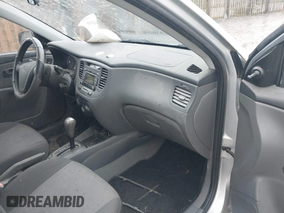 2009 Kia Rio SX with VIN KNADE223596538965, listed as a IAAI auction lot 42029409 with 143,794 mi miles. Bid and sale history available at carsss.com. Image 5.
