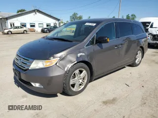 2011 Honda Odyssey Touring с VIN 5FNRL5H94BB078137, выставлен на аукционе Copart как лот 57467505 с пробегом 210 405 миль миль и Списание • Salvage title. История ставок и продаж доступна на DreamBid. Изображение 1.