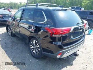 2019 Mitsubishi Outlander SE with VIN JA4AD3A33KZ005401, listed as a IAAI auction lot 42270895 with 58,080 mi miles and . Bid and sale history available at DreamBid. Image 3.