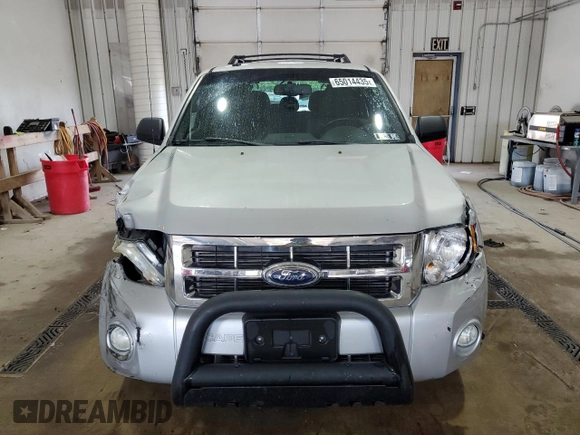 2012 Ford Escape XLT with VIN 1FMCU9D75CKC35544, listed as a Copart auction lot 65014435 with 135,740 mi miles and Salvage title. Bid and sale history available at DreamBid. Image 5.