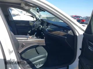 2012 BMW 7 Series 740i with VIN WBAKA4C51CDS99206, listed as a IAAI auction lot 42555719 with 104,303 mi miles and . Bid and sale history available at DreamBid. Image 5.