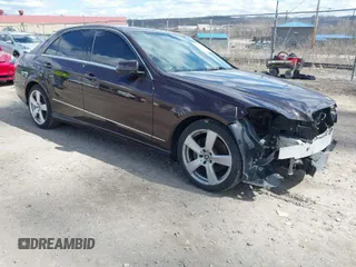 2011 Mercedes-Benz E-Class E 350 Luxury with VIN WDDHF8HB0BA447923, listed as a IAAI auction lot 41870557 with 157,089 mi miles. Bid and sale history available at carsss.com. Image 1.