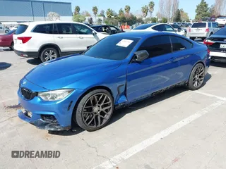2015 BMW 4 Series 435i with VIN WBA3R1C50FF774588, listed as a IAAI auction lot 42001394 with 96,400 mi miles and . Bid and sale history available at carsss.com. Image 18.