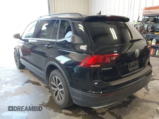 2021 Volkswagen Tiguan S with VIN 3VV0B7AX8MM020189, listed as a IAAI auction lot 42615767 with 70,294 mi miles and . Bid and sale history available at DreamBid. Image 3.