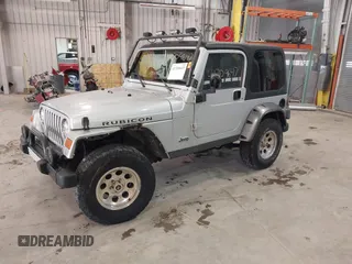 2003 Jeep Wrangler Rubicon with VIN 1J4FA69S13P375142, listed as a IAAI auction lot 41709647 with 125,443 mi miles and . Bid and sale history available at DreamBid. Image 2.