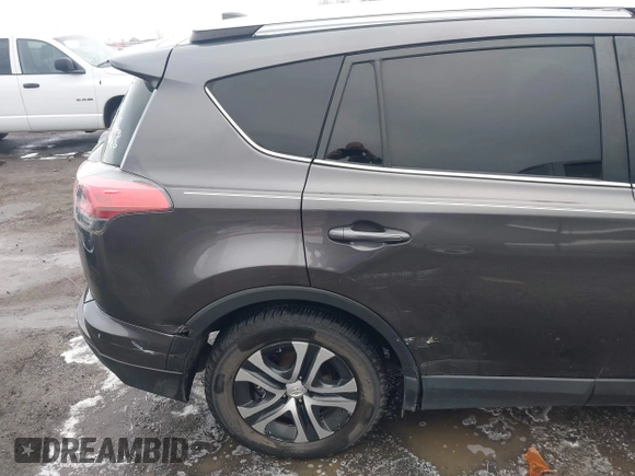 2016 Toyota RAV4 LE with VIN JTMZFREV5GJ093472, listed as a IAAI auction lot 41332037 with 212,869 mi miles. Bid and sale history available at carsss.com. Image 19.