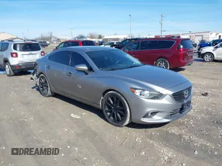 2015 Mazda 6 i Grand Touring with VIN JM1GJ1W68F1170459, listed as a IAAI auction lot 41759915 with 109,911 mi miles. Bid and sale history available at carsss.com. Image 1.
