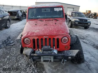 2012 Jeep Wrangler Unlimited Sport with VIN 1C4HJWDG7CL114297, listed as a Copart auction lot 42144525 with 165,482 mi miles and Salvage Title. Bid and sale history available at carsss.com. Image 5.