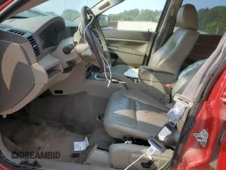 2005 Jeep Grand Cherokee Laredo с VIN 1J4HR48N85C558730, выставлен на аукционе Copart как лот 59030645 с пробегом 169 233 миль миль и Списание • Salvage title. История ставок и продаж доступна на DreamBid. Изображение 7.