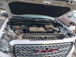 2020 GMC Sierra 1500 Denali with VIN 1GTU9FED8LZ370425, listed as a IAAI auction lot 41172378 with 57,291 mi miles and . Bid and sale history available at DreamBid. Image 10.