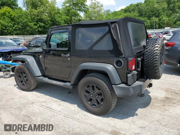 2015 Jeep Wrangler Freedom Edition with VIN 1C4AJWAG8FL688255, listed as a Copart auction lot 59722165 with 130,666 mi miles and Salvage title. Bid and sale history available at DreamBid. Image 2.