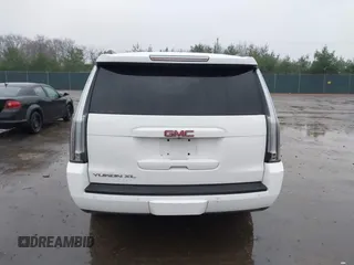2015 GMC Yukon XL SLT with VIN 1GKS1HKC7FR223513, listed as a IAAI auction lot 40822575 with 128,239 mi miles. Bid and sale history available at carsss.com. Image 16.
