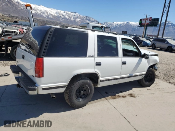 1999 GMC Yukon with VIN 1GKEC13R4XJ809507, listed as a Copart auction lot 50922655 with 227,923 mi miles and Salvage Title. Bid and sale history available at carsss.com. Image 3.