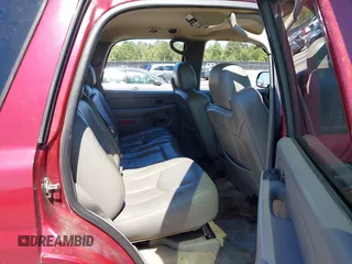 2004 Chevrolet Tahoe LS with VIN 1GNEC13Z74R207698, listed as a IAAI auction lot 42310462 with 255,218 mi miles and . Bid and sale history available at DreamBid. Image 8.