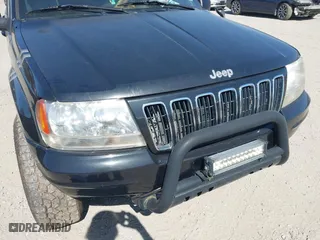2002 Jeep Grand Cherokee Limited with VIN 1J4GW58N62C308103, listed as a IAAI auction lot 41760396 with 247,152 mi miles. Bid and sale history available at carsss.com. Image 6.