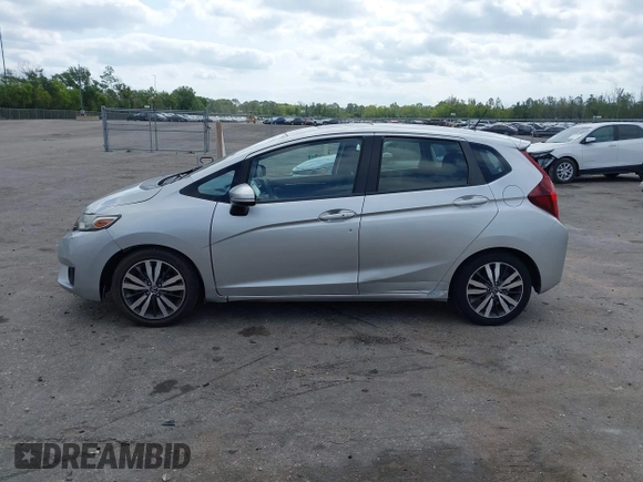 2016 Honda Fit EX with VIN JHMGK5H74GX000882, listed as a IAAI auction lot 42091641 with 64,210 mi miles and . Bid and sale history available at DreamBid. Image 14.