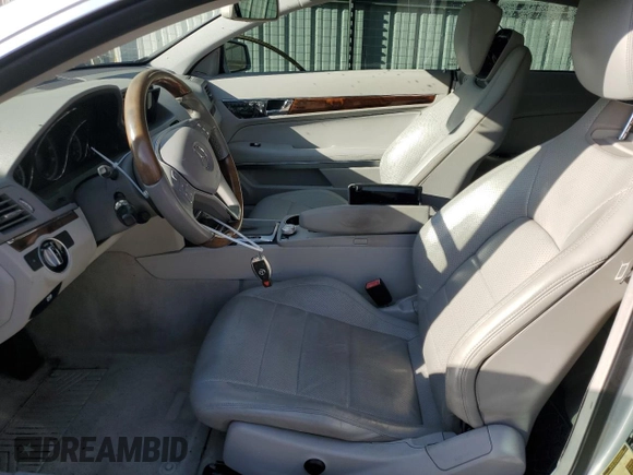 2012 Mercedes-Benz E 550 with VIN WDDKJ7DB2CF151973, listed as a Copart auction lot 82667474 with 130,590 mi miles and Salvage Title. Bid and sale history available at DreamBid. Image 7.