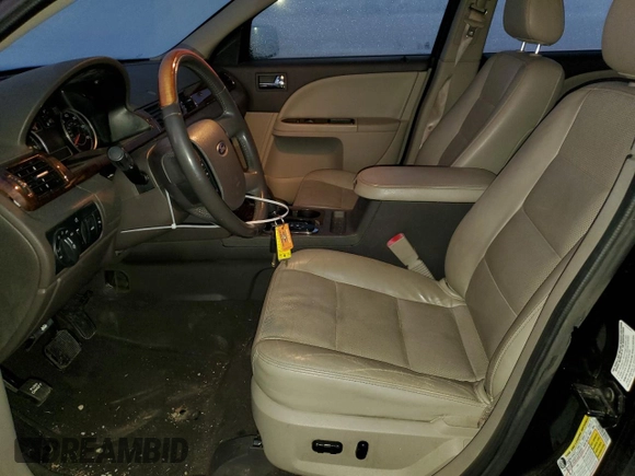 2008 Ford Taurus Limited with VIN 1FAHP25W48G112543, listed as a Copart auction lot 83317684 with 35,046 mi miles and Salvage Title. Bid and sale history available at DreamBid. Image 7.