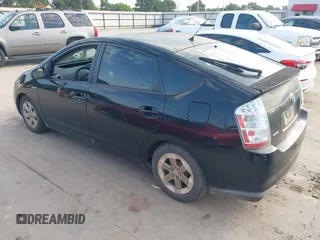 2009 Toyota Prius with VIN JTDKB20U697848843, listed as a IAAI auction lot 42222208 with 233,375 mi miles and . Bid and sale history available at carsss.com. Image 3.