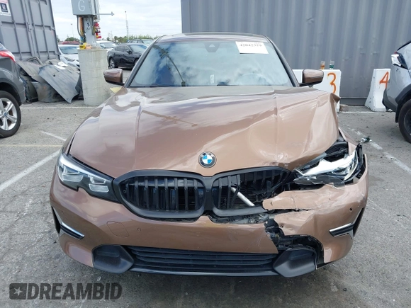 2019 BMW 3 Series 330i with VIN WBA5R1C57KAK07519, listed as a IAAI auction lot 42042379 with 40,898 mi miles and . Bid and sale history available at DreamBid. Image 12.