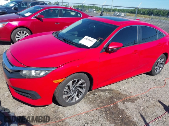 2017 Honda Civic EX z VIN 2HGFC2F77HH535613, wystawiony jako IAAI lot #42208566 z przebiegiem 121 024 mil mil oraz . Historia ofert i sprzedaży dostępna na DreamBid. Obrazek 17.