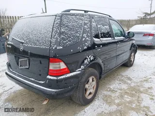 2001 Mercedes-Benz M-Class with VIN 4JGAB54E21A252034, listed as a IAAI auction lot 41573177 with 168,672 mi miles. Bid and sale history available at carsss.com. Image 4.