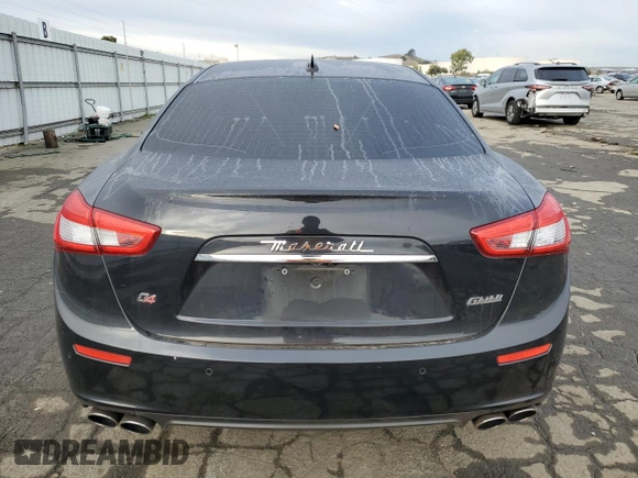 2015 Maserati Ghibli S Q4 with VIN ZAM57RTA8F1150575, listed as a Copart auction lot 38179884 with 59,174 mi miles. Bid and sale history available at carsss.com. Image 6.