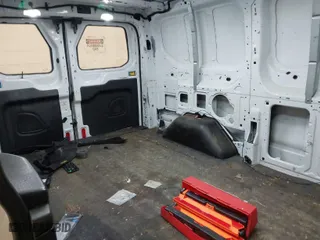2016 Ford Transit Cargo Van with VIN 1FTYR1ZM1GKB35717, listed as a IAAI auction lot 41711883 with 183,157 mi miles. Bid and sale history available at carsss.com. Image 8.