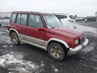 1996 Suzuki Sidekick z VIN JS3TD21V0T4107927, wystawiony jako IAAI lot #41249522 z przebiegiem 225 665 mil mil oraz . Historia ofert i sprzedaży dostępna na DreamBid. Obrazek 1.