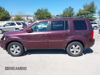2011 Honda Pilot EX with VIN 5FNYF4H45BB063910, listed as a IAAI auction lot 41893578 with 221,918 mi miles. Bid and sale history available at carsss.com. Image 14.