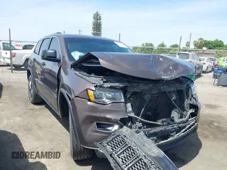 2020 Jeep Grand Cherokee Altitude with VIN 1C4RJEAG3LC220295, listed as a IAAI auction lot 42118183 with 104,097 mi miles and . Bid and sale history available at DreamBid. Image 1.