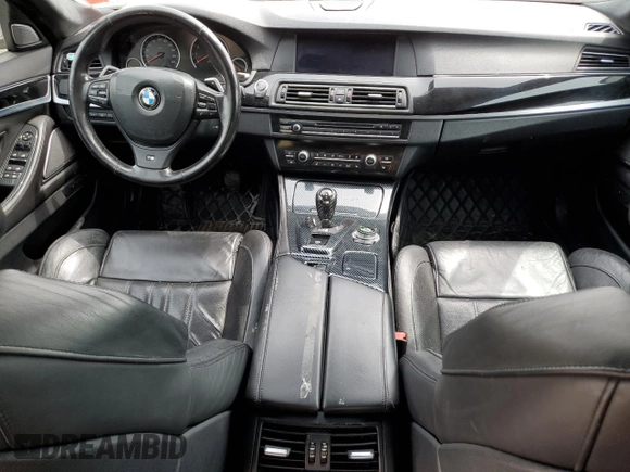 2013 BMW M5 z VIN WBSFV9C54DD095421, wystawiony jako Copart lot #53492515 z przebiegiem Nie podano mil oraz Szkoda całkowita • Salvage title. Historia ofert i sprzedaży dostępna na DreamBid. Obrazek 8.