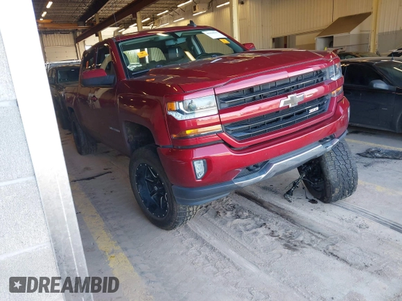 2018 Chevrolet Silverado 1500 LT with VIN 3GCUKREC0JG580317, listed as a IAAI auction lot 41868522 with 75,738 mi miles. Bid and sale history available at carsss.com. Image 1.