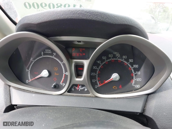 2012 Ford Fiesta SE with VIN 3FADP4EJ4CM215670, listed as a IAAI auction lot 41980900 with 87,874 mi miles. Bid and sale history available at carsss.com. Image 7.