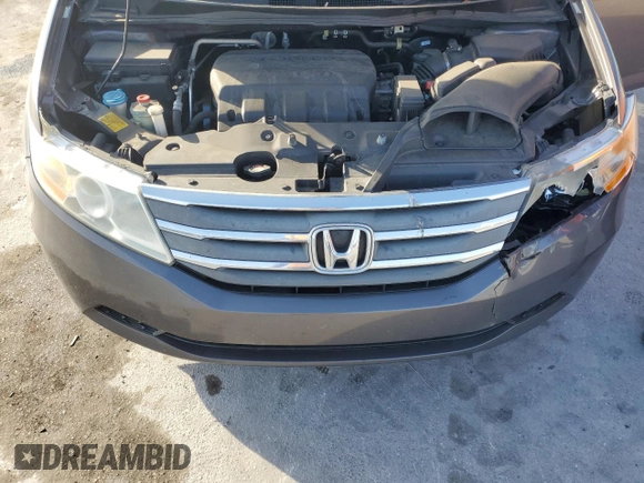 2012 Honda Odyssey EX-L with VIN 5FNRL5H66CB146350, listed as a Copart auction lot 55428555 with 171,207 mi miles and Salvage Title. Bid and sale history available at DreamBid. Image 12.