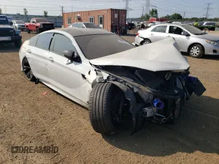 2015 BMW M6 z VIN WBS6C9C51FD467998, wystawiony jako Copart lot #67775934 z przebiegiem Nie podano mil oraz Szkody całkowita. Historia ofert i sprzedaży dostępna na DreamBid. Obrazek 4.
