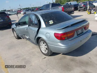 2002 Saturn SL z VIN 1G8ZK54702Z130021, wystawiony jako IAAI lot #42091064 z przebiegiem 68 754 mil mil oraz . Historia ofert i sprzedaży dostępna na DreamBid. Obrazek 3.